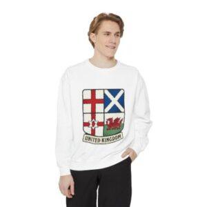 This relaxed, medium-weight sweatshirt brings quiet pride and everyday comfort together. The soft ring-spun cotton blend feels substantial without being stiff, and the garment-dyed finish gives the white fabric a slightly worn, lived-in look. A stitched crest-style graphic on the front channels heritage and travel — it reads like a well-loved patch you might pin to a vintage duffel before a ferry crossing or a road trip across the isles. Practical details — ribbed collar, cuffs and hem, twill neck tape, and a half-moon back patch — keep the shape steady through repeated wear. Wear it layered over a tee for cool mornings, or alone when you want a simple, iconic statement that whispers rather than shouts. Product features - 80% ring-spun cotton / 20% polyester medium-heavy knit (9.5 oz) — soft, durable, great for printing - Relaxed fit with 1x1 ribbed collar, cuffs, and bottom hem for secure stretch and recovery - Twill neck tape and half-moon back patch for stability and comfort - OEKO-TEX® certified low-impact dyes and sewn-in twill label - Embroidery-ready print areas on left chest and center chest; adult sizes, sourced from Honduras/El Salvador Care instructions - Machine wash: cold (max 30C or 90F) - Non-chlorine: bleach as needed - Tumble dry: low heat - Do not dryclean - United Kingdom Crest Sweatshirt — UK Flag Patch Pullover